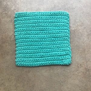 Handmade aqua blue knitted washcloth